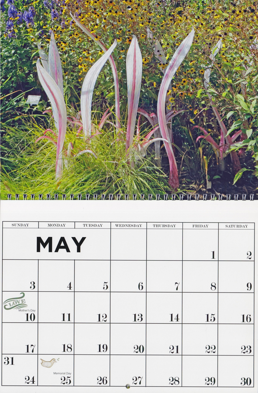 A calendar of a Chihuly exhibit is an example of a Place theme.