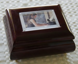 A music box personalized with a photograph.