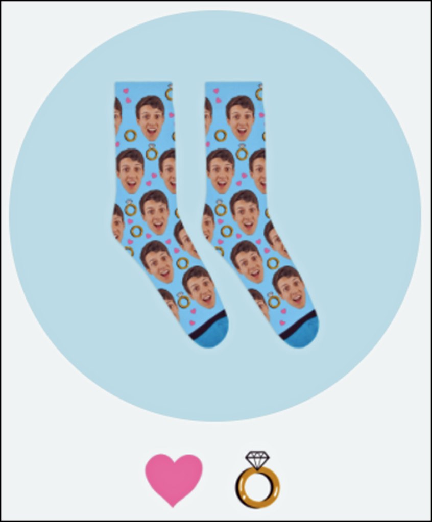 A picture of a pair of custom socks with rings and hearts scattered among the faces.